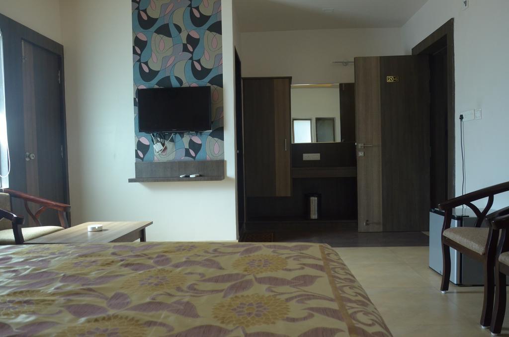 City Inn Hotel & Restaurant Jabalpur Pokoj fotografie