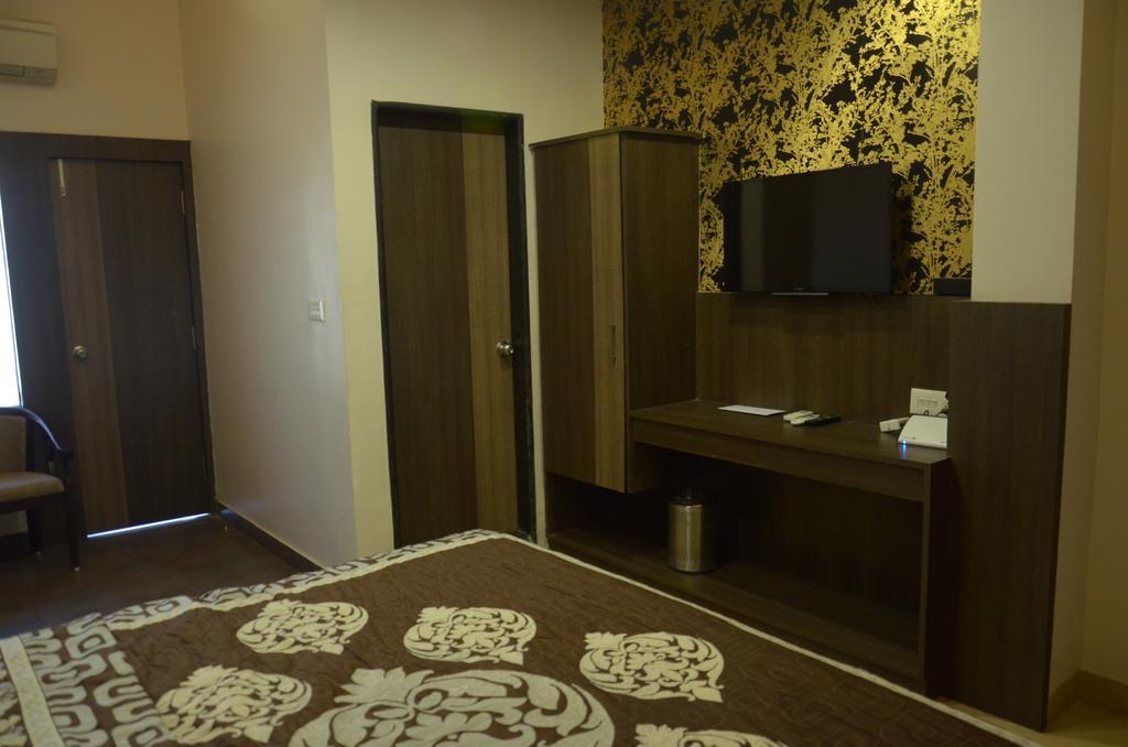 City Inn Hotel & Restaurant Jabalpur Pokoj fotografie
